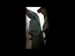 Horny dude's jacking off in a public toilet 